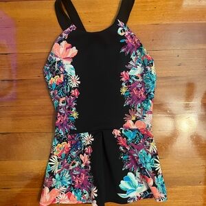 Flattering flowered crossed strap racer back.
